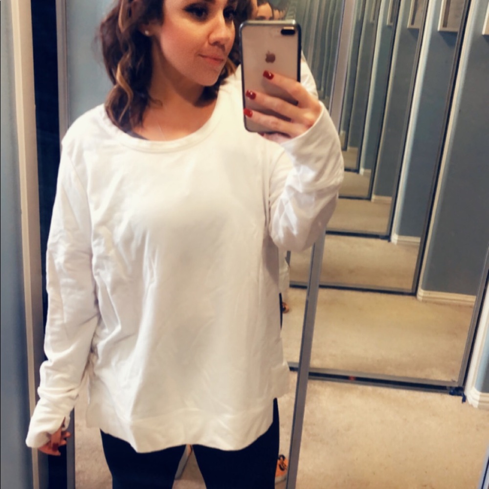 White workout sweater with open back